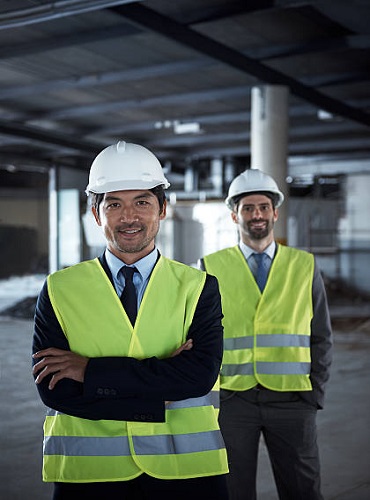 Cropped portrait of two engineers on a construction site